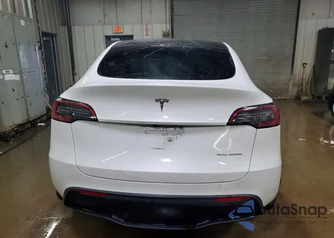 2023 Tesla Model Y from USA, damaged, VIN 7SAYGDEE7PF803039